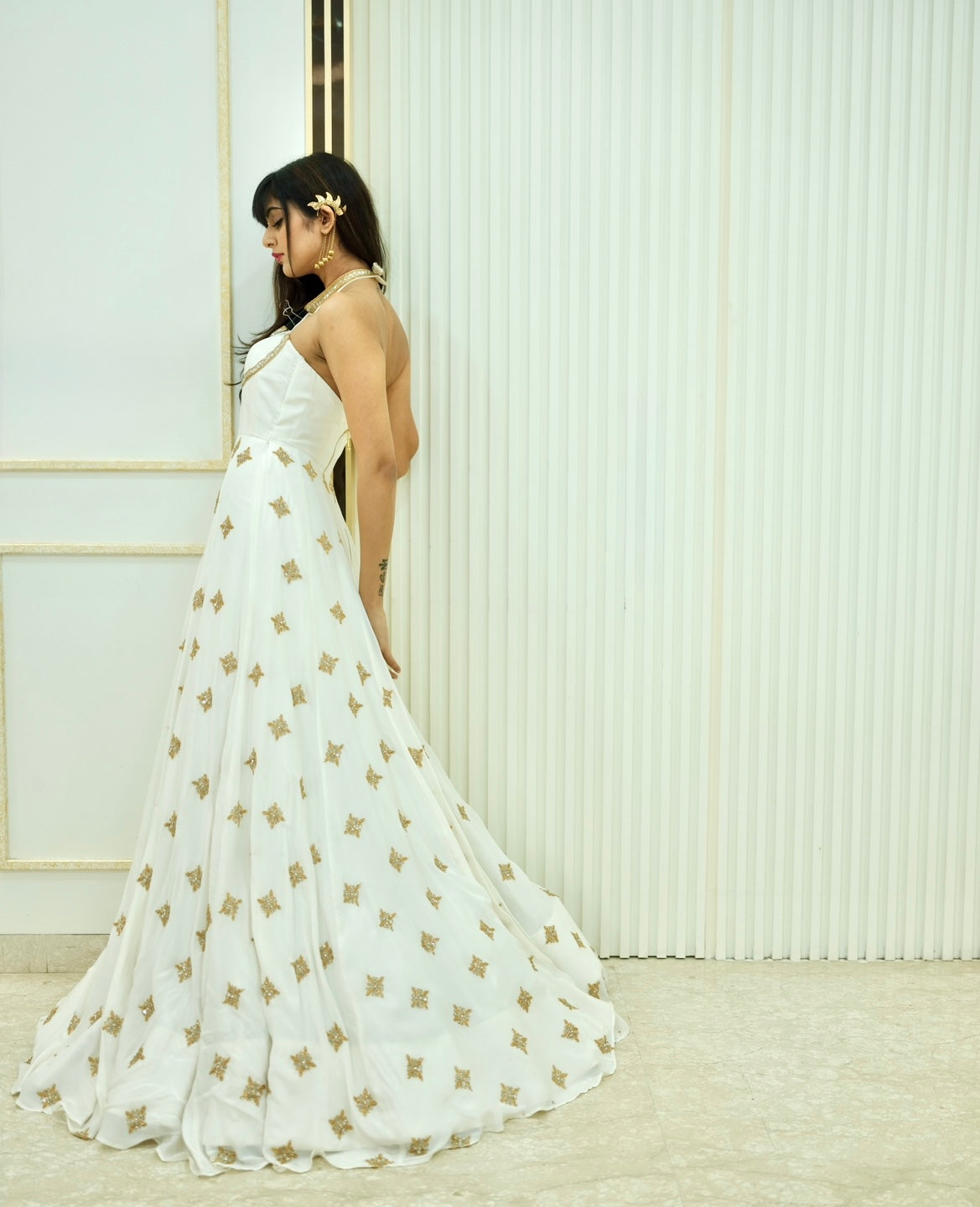 ivory amber designer gown, side pose